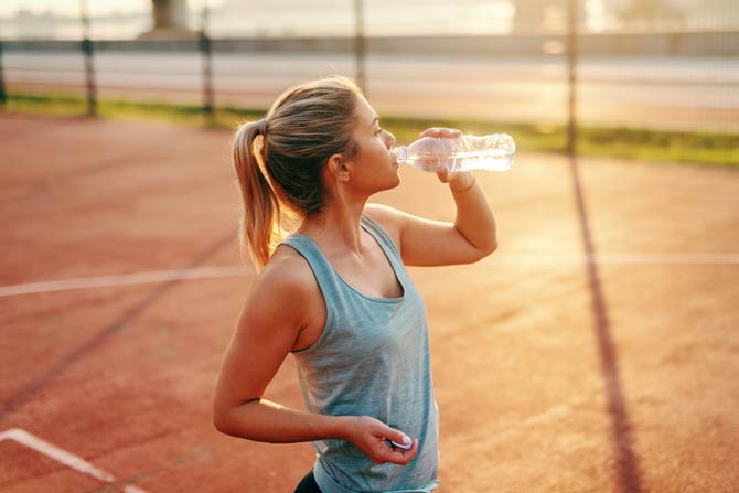 Sport im- Sommer - Wasser trinken